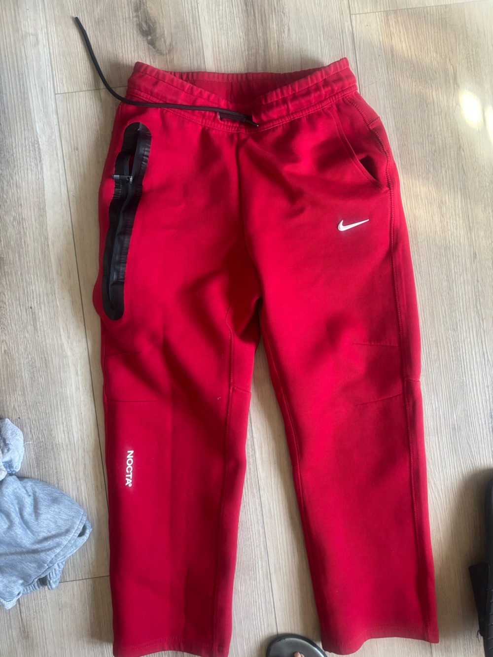 Nike Red Nocta Tech Fleece Joggers